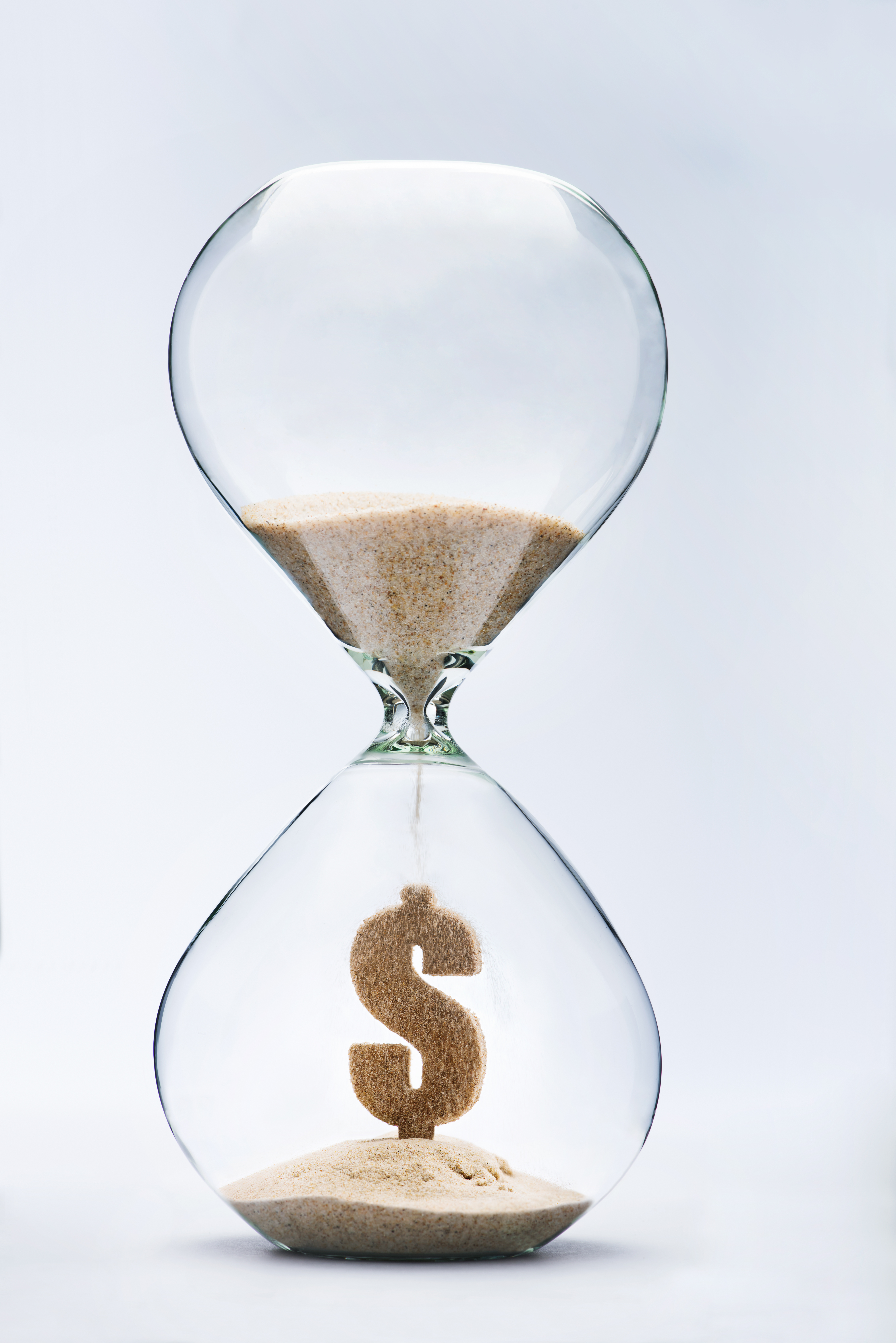 A picture of a an hour glass with money symbol inside